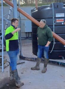 Harry Davies (left) at Hopes Ash Farm, with Giles Russell from Midland Slurry Systems